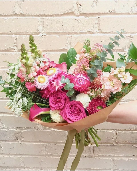Elegant pink and white peony bouquet hand-tied with stems